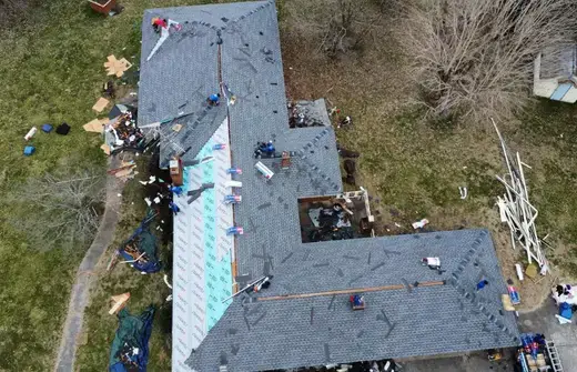 Aerial view of a roof replacement in progress