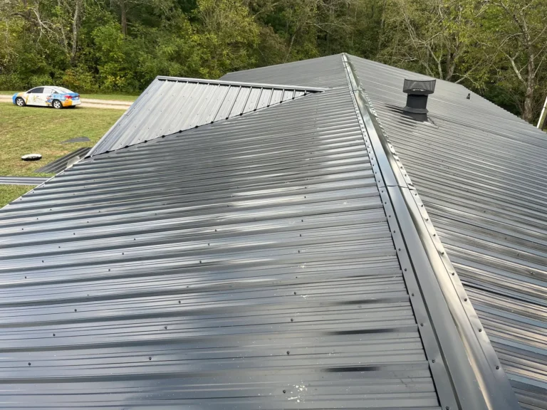 Close-up of a newly installed gray metal roof