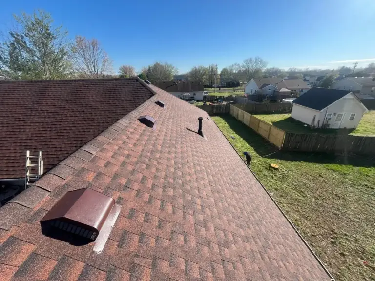 New reddish-brown shingle roof with roof vents